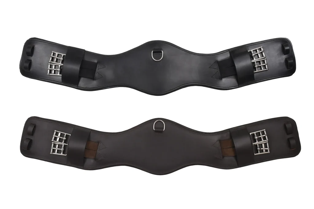 Jumping Girth (VT-GIRTH-111) - Premium cow leather dressage girth designed with stainless steel buckles and elastic inserts. The full-size adjustable design provides flexible fitting,...