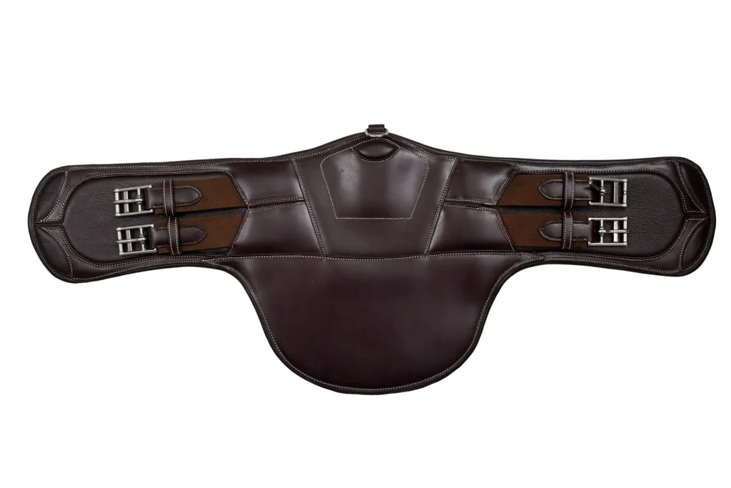 Jumping Girth (VT-GIRTH-117) - Premium cow leather dressage girth with stainless steel buckles and elastic inserts for flexible support. Designed for training and competition,...