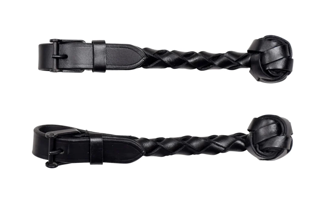 Saddle Holder - Hand-braided leather saddle holder made from black DD leather with Spanish Bukkal detailing. Designed in full size, it offers a...