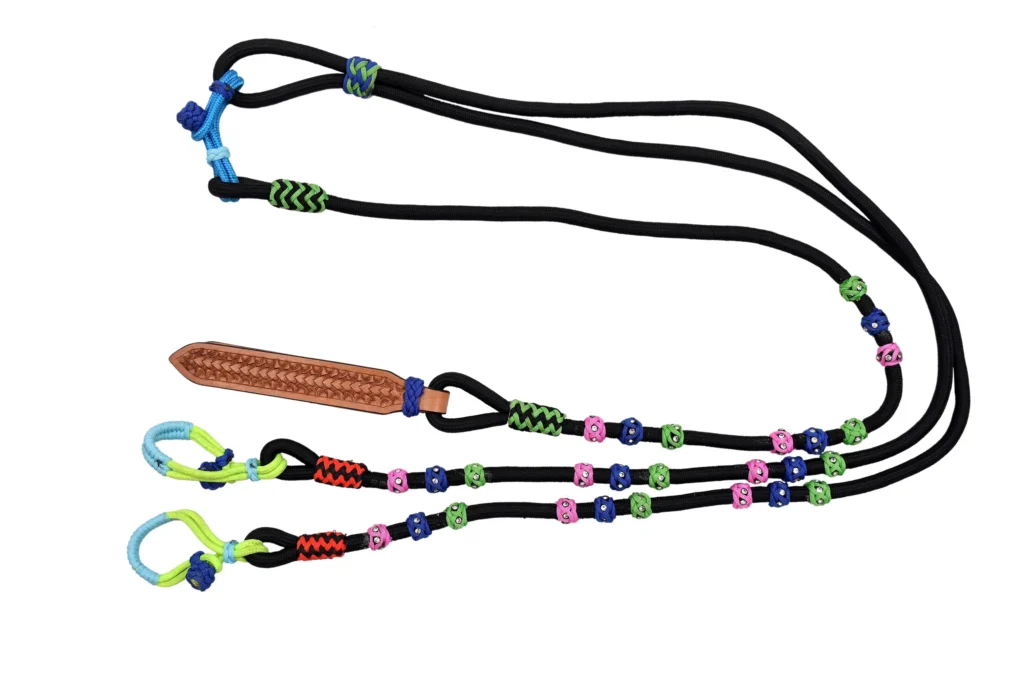 Roman Reins 2 - Diamond-cut gem nylon rope reins designed with leather quirt accents for a refined appearance. Built with a durable rope structure,...